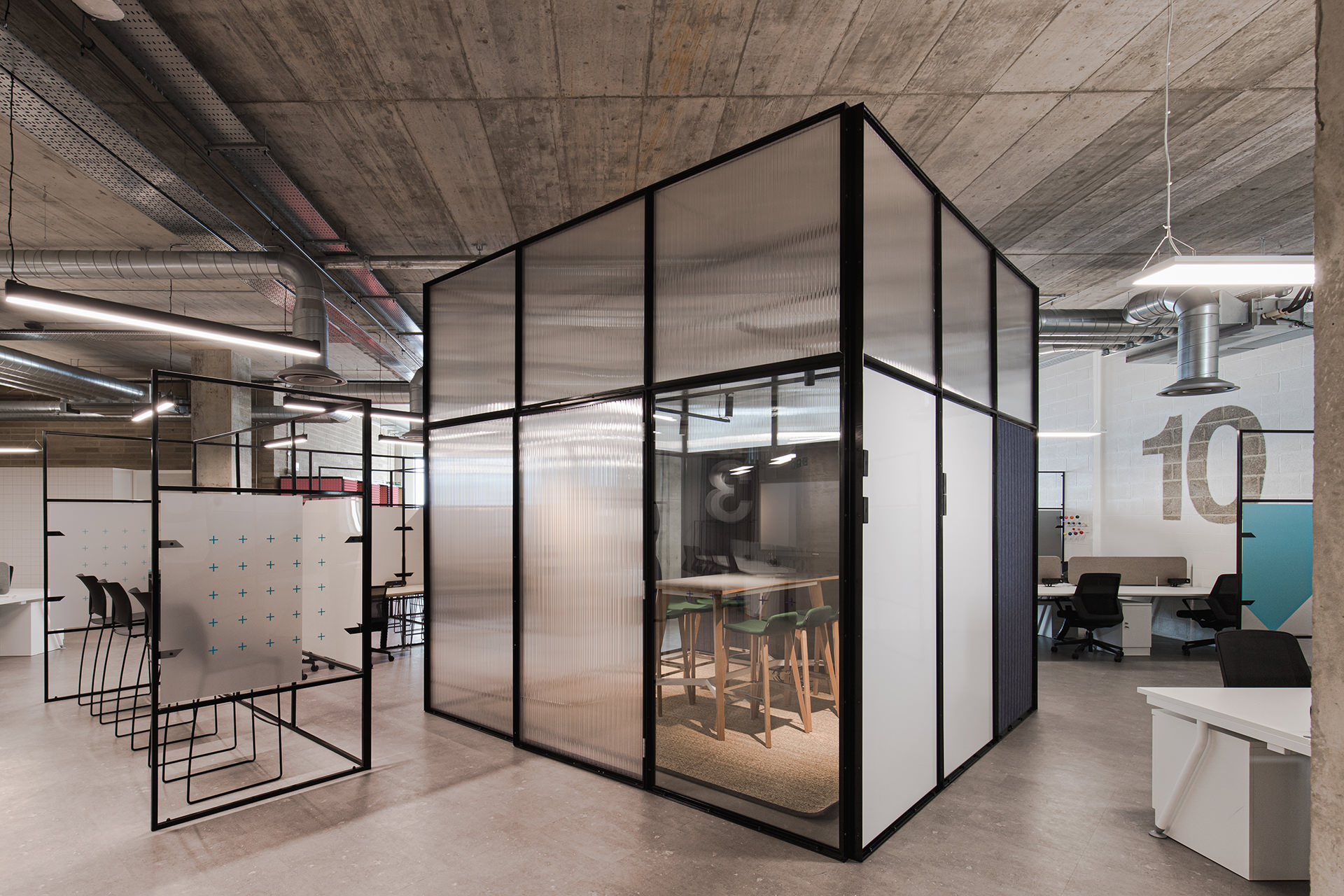 An internal view of an industrial designed communal workplace