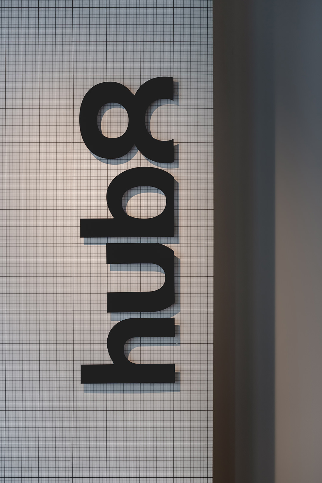 close up of internal branded signage in a communal workplace