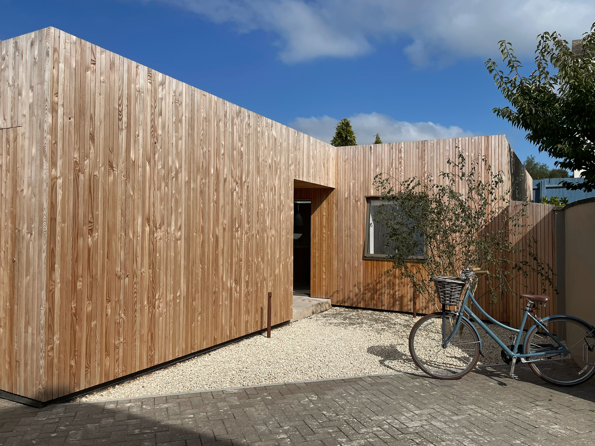 Entrance to Cedar cladded house